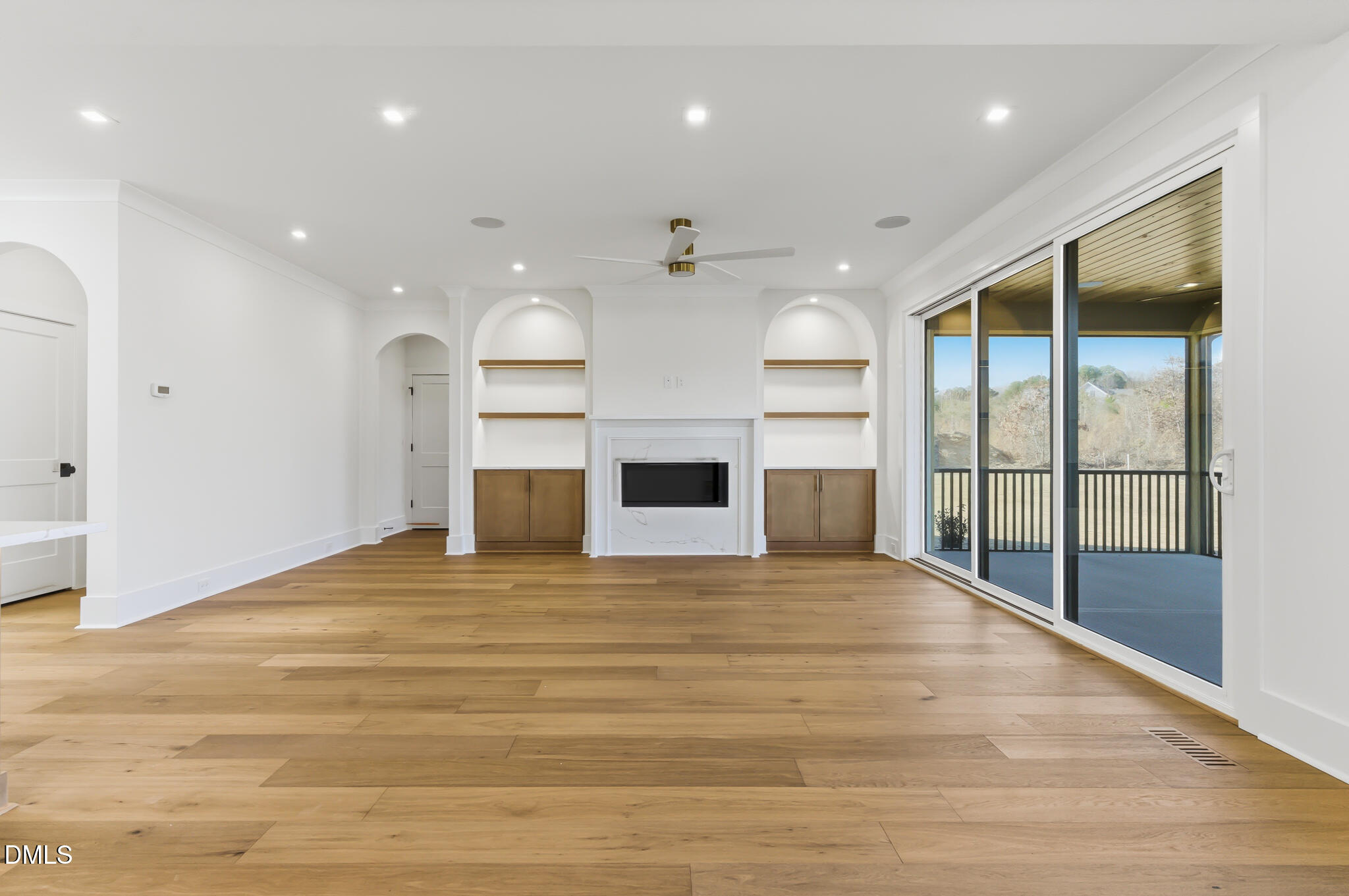 45 Harvest View Way Franklinton, NC 27525 - Photo 14 of 64 a view of an empty room with a fireplace and a window