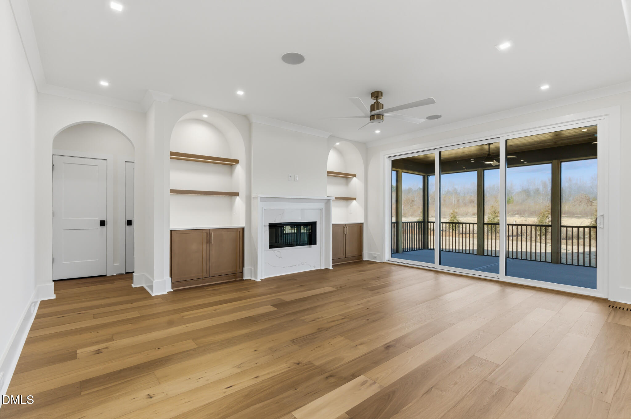 45 Harvest View Way Franklinton, NC 27525 - Photo 15 of 64 a view of an empty room with a fireplace and a window