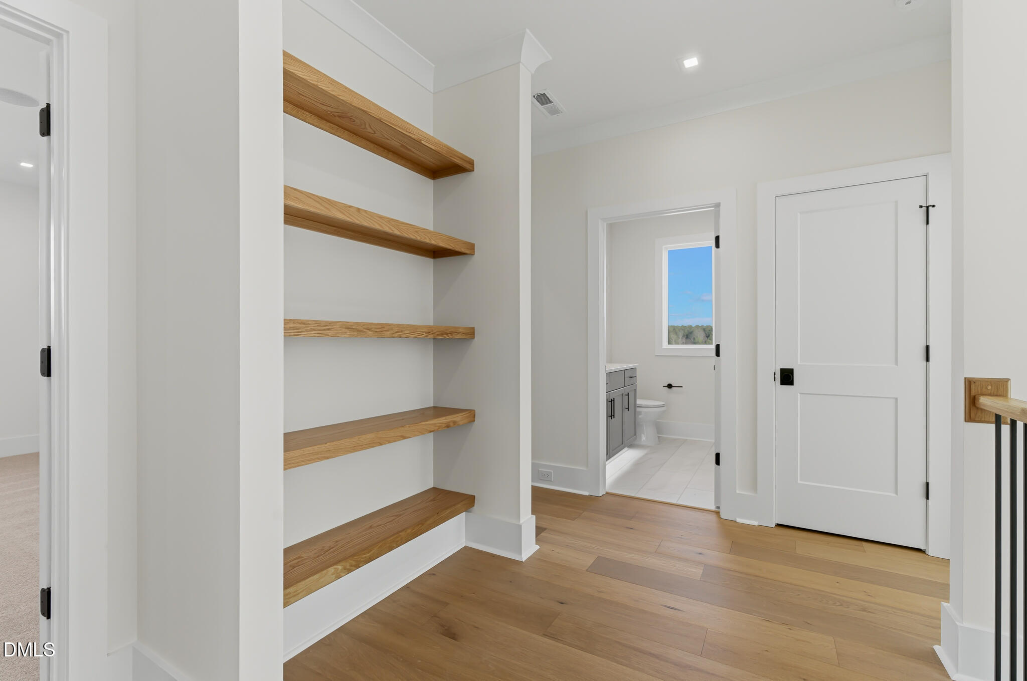 45 Harvest View Way Franklinton, NC 27525 - Photo 41 of 64 a view of an empty room with wooden floor and closet