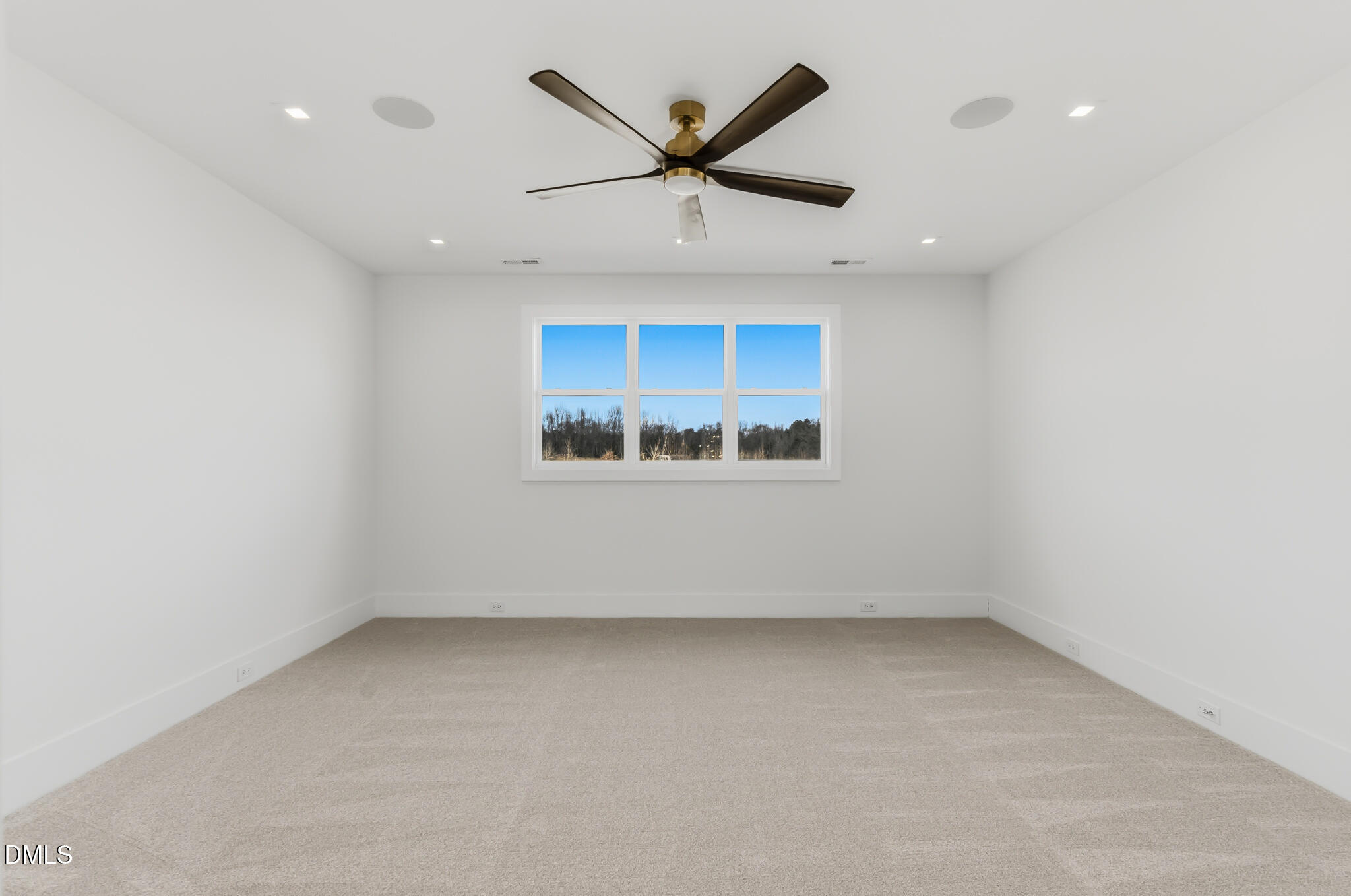 45 Harvest View Way Franklinton, NC 27525 - Photo 47 of 64 an empty room with a ceiling fan and window