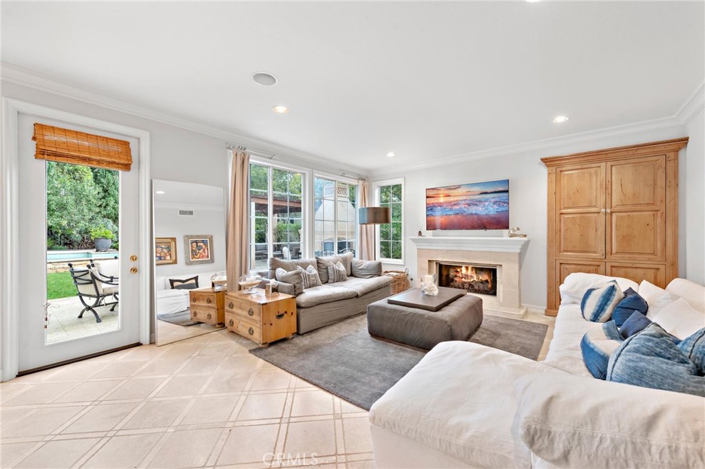 1 Meryton Irvine, CA 92603 - Photo 11 of 40 a living room with furniture large window and outer view