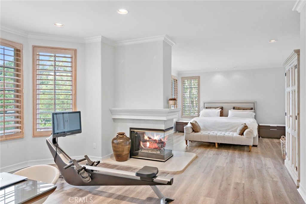 1 Meryton Irvine, CA 92603 - Photo 24 of 40 a living room with furniture and a fireplace