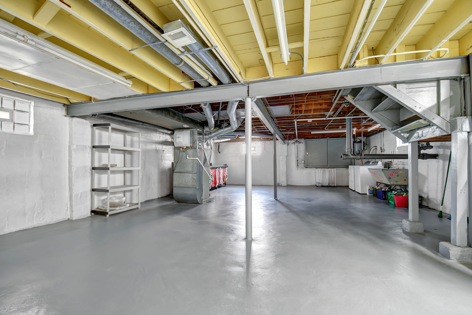 9041 South East End Avenue Chicago, IL 60617 - Photo 15 of 18 a view of empty room with wooden ceiling