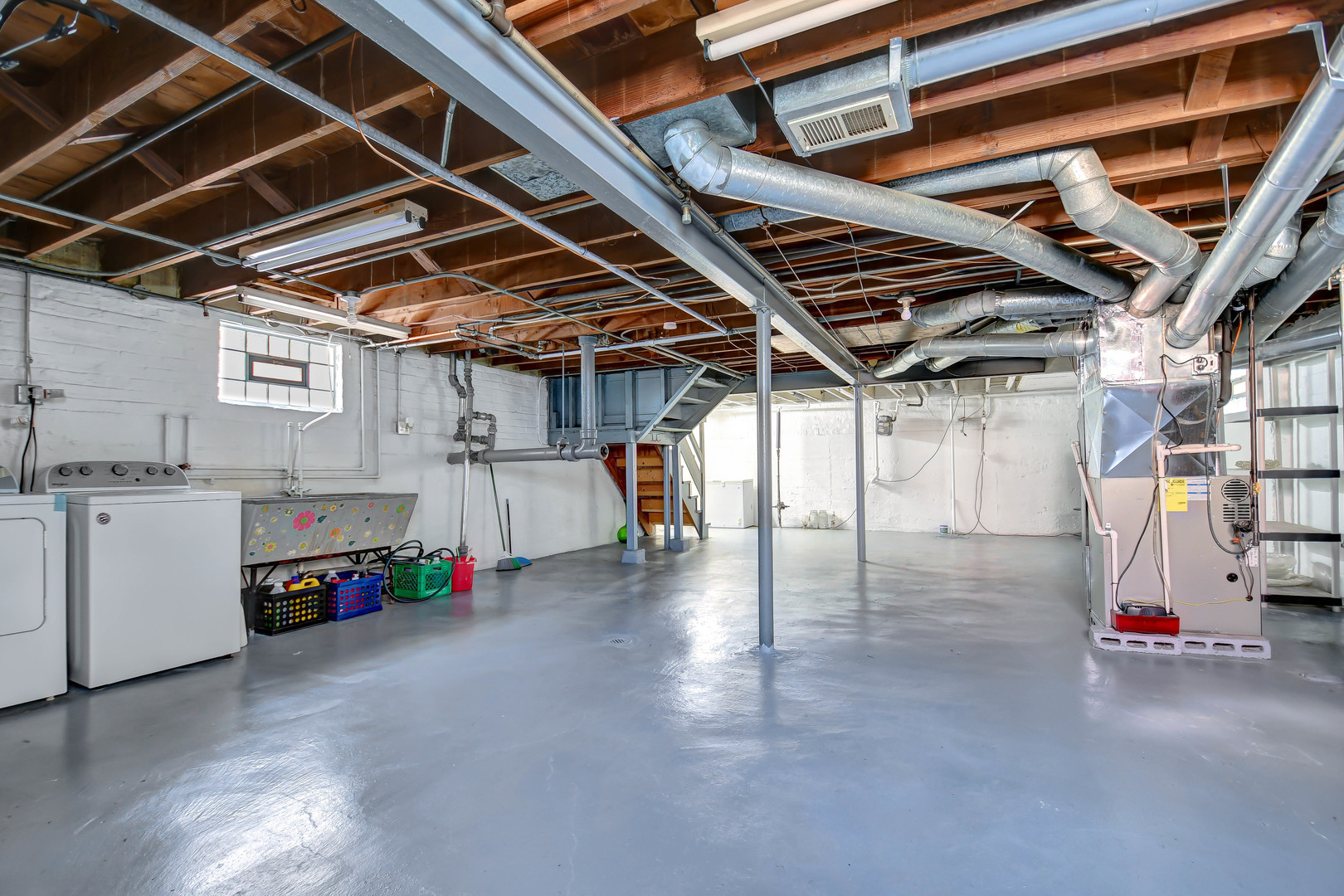 9041 South East End Avenue Chicago, IL 60617 - Photo 16 of 18 a view of storage and utility room with utility room