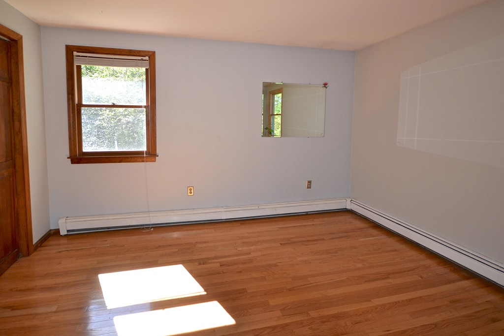 19 Bishop Road Rochester, MA 02770 - Photo 15 of 21 an empty room with a window