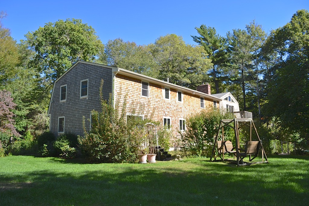 19 Bishop Road Rochester, MA 02770 - Photo 17 of 21 a view of a house with a yard