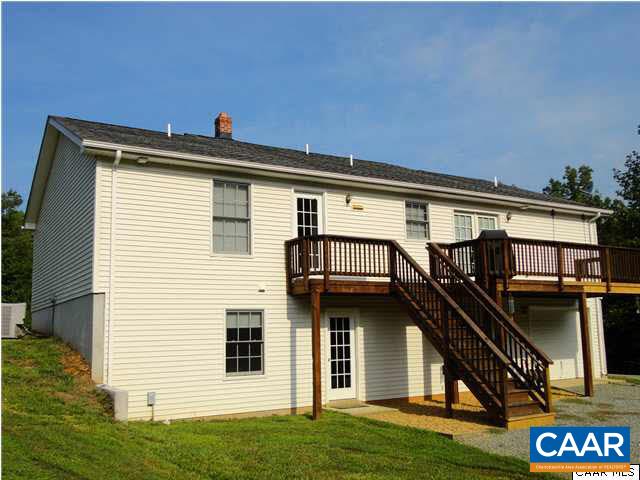 3804 Roundabout Road Louisa, VA 23093 - Photo 17 of 21 a view of a house with many windows