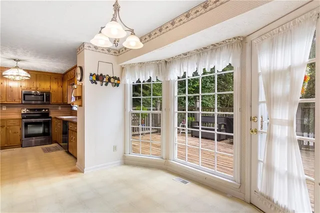 a view of a kitchen with furniture and a kitchen