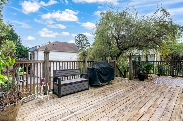 a view of a wooden deck with a patio