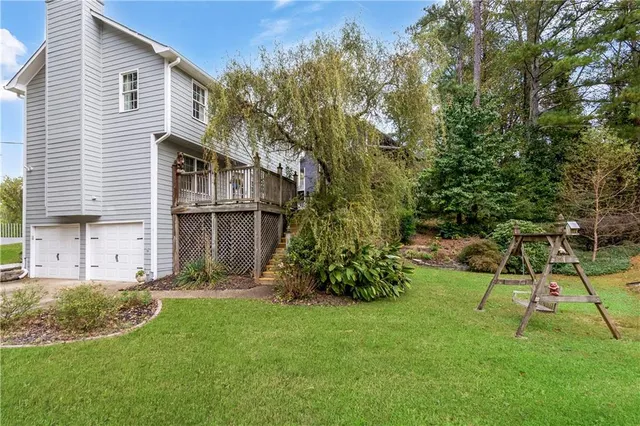 a view of backyard of a house