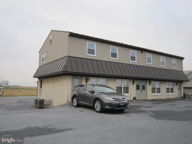 a view of a lake with a big yard