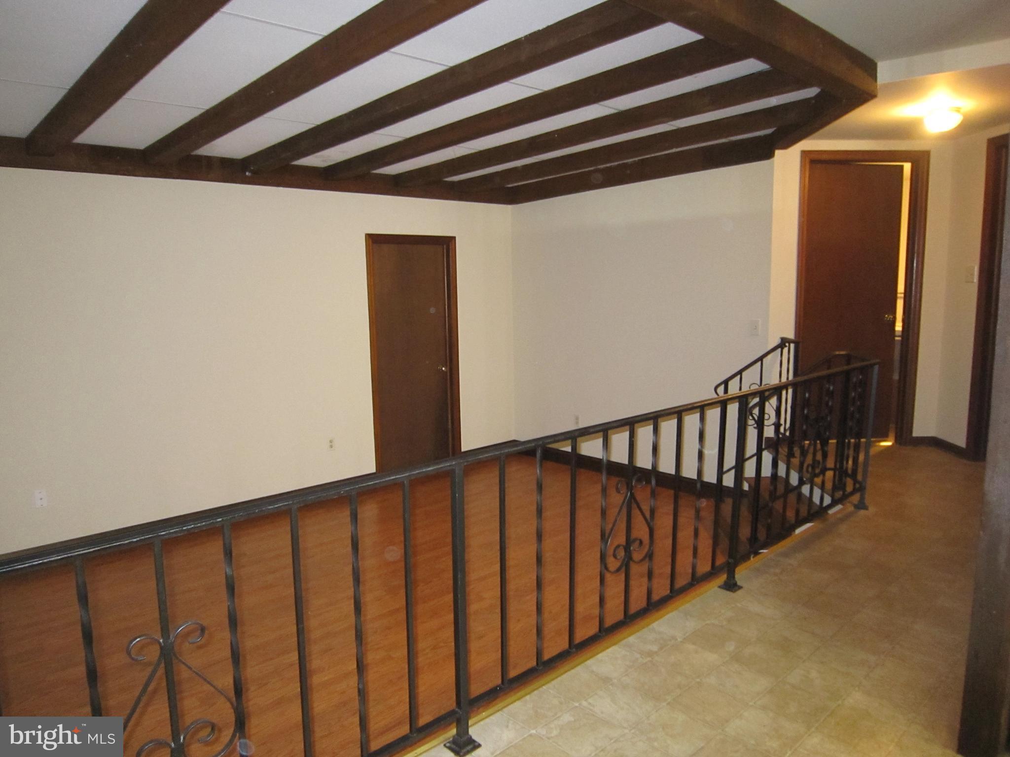 304 North Hoover Avenue, Unit B New Holland, PA 17557 - Photo 3 of 17 a view of staircase with rug