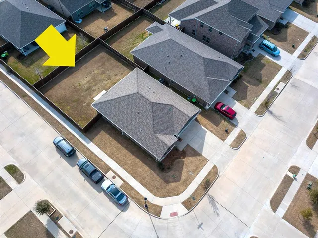 an aerial view of a backyard