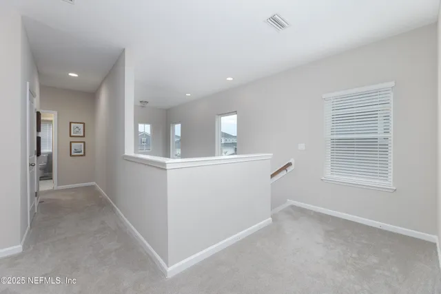 a view of livingroom with kitchen