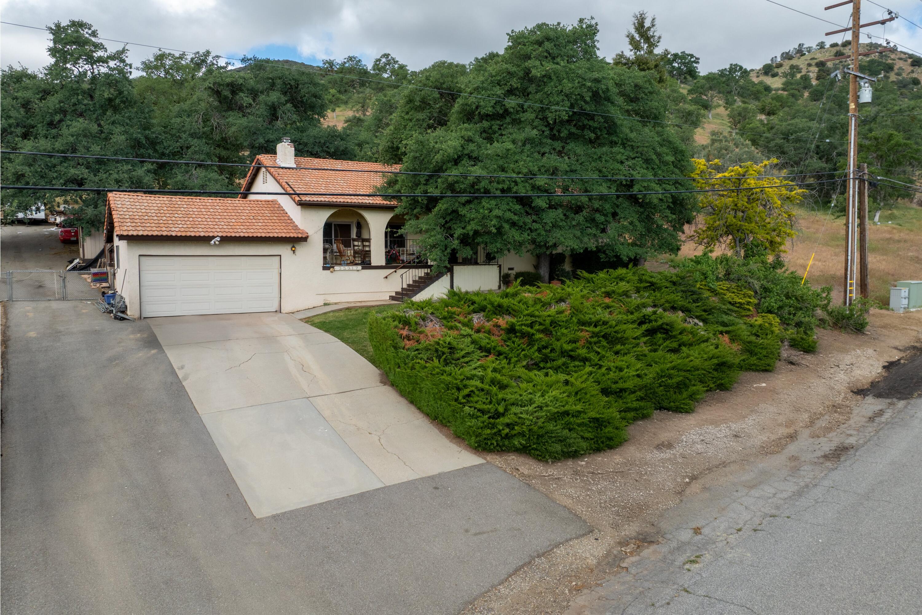 22217 Valley Vista Drive Tehachapi, CA 93561 - Photo 1 of 17 a house with trees in front of it
