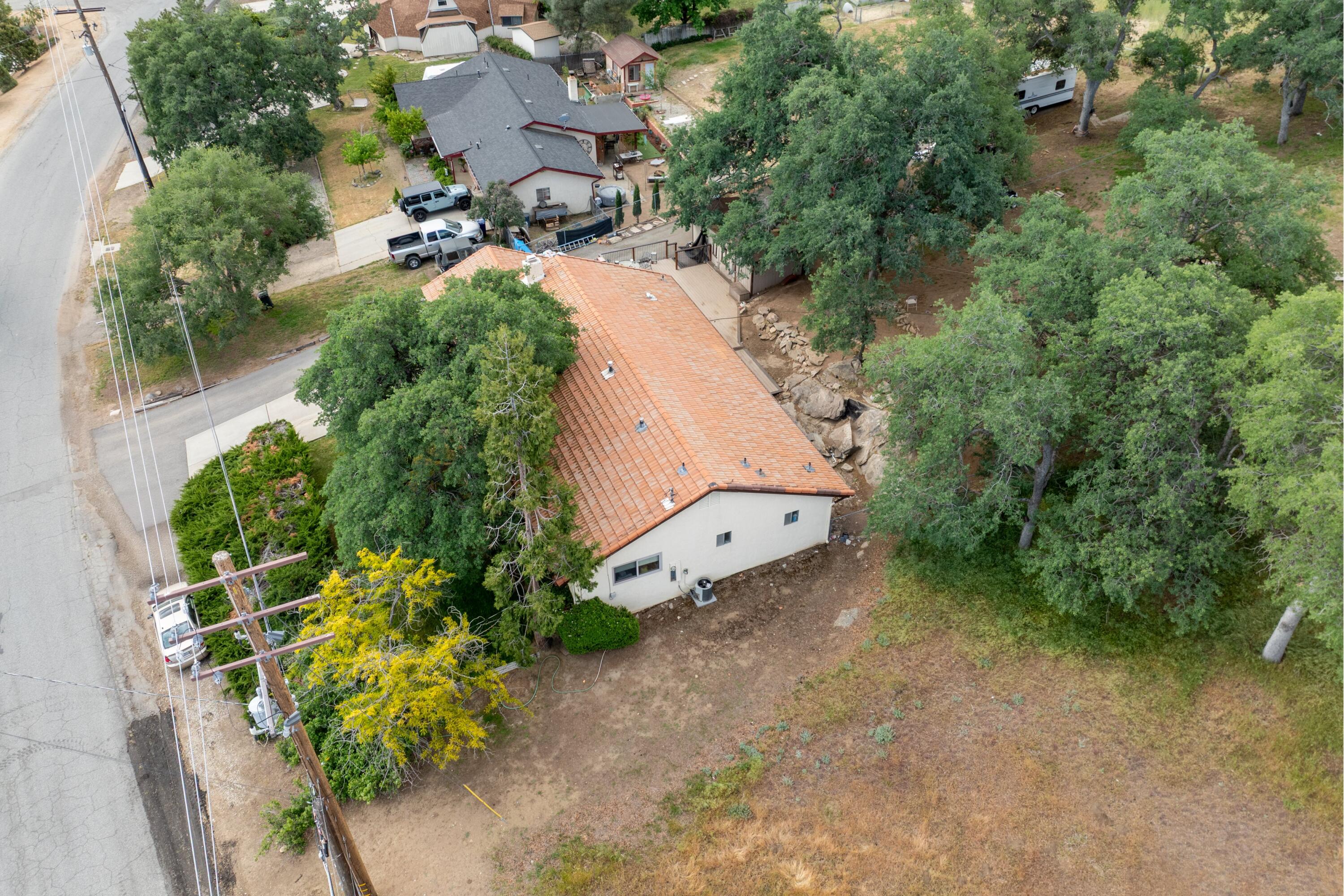 22217 Valley Vista Drive Tehachapi, CA 93561 - Photo 13 of 17 an aerial view of a house with a yard basket ball court and outdoor seating