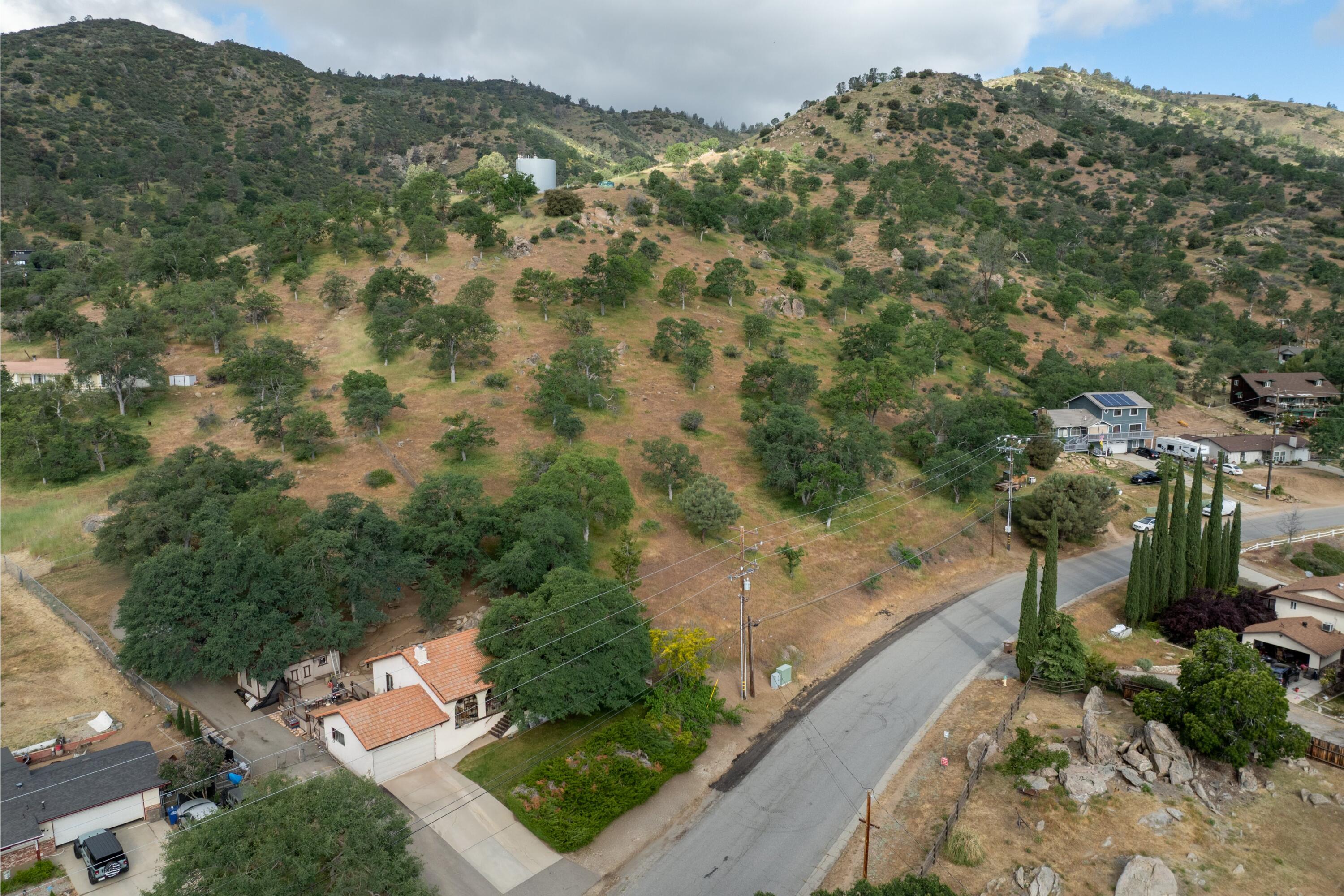 22217 Valley Vista Drive Tehachapi, CA 93561 - Photo 16 of 17 a view of a yard with a mountain