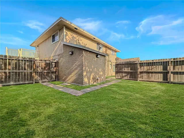 a view of a backyard with a garden