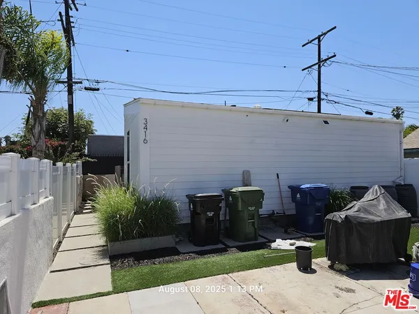 a backyard of a house with seating space