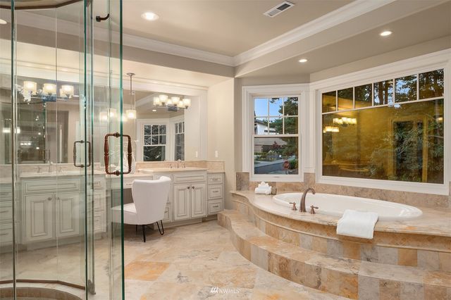a utility room with sink dryer and washer