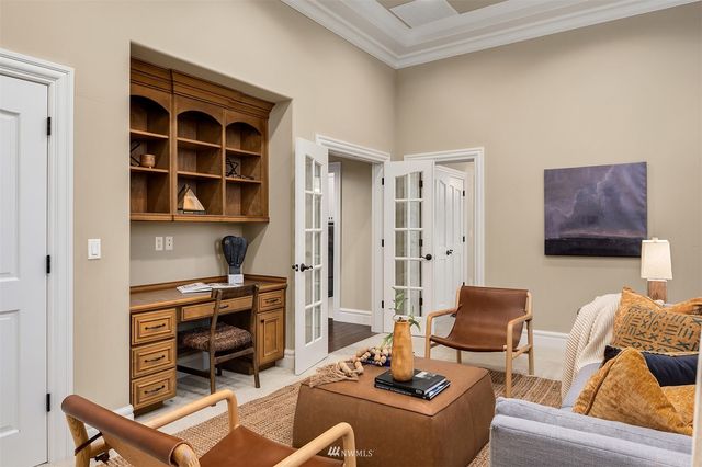 a bathroom with a granite countertop sink a toilet and bathtub
