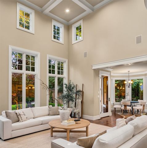 a living room with furniture or kitchen view and a wooden floor