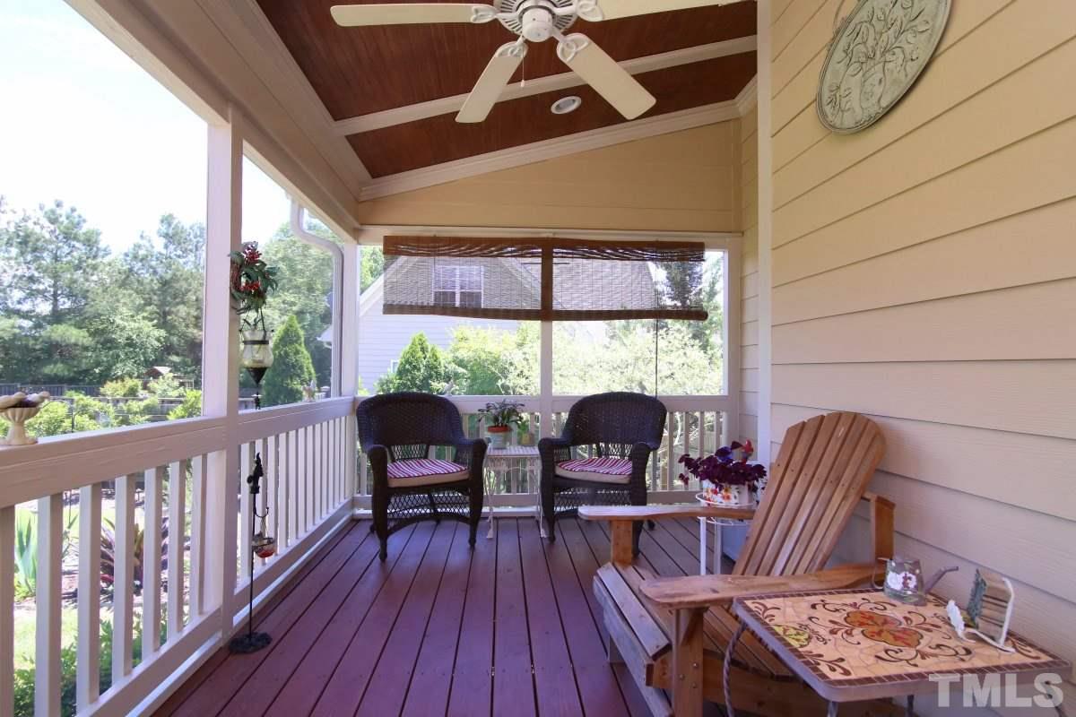 1012 Newburgh Circle Raleigh, NC 27603 - Photo 20 of 25 a view of balcony with chairs and wooden floor