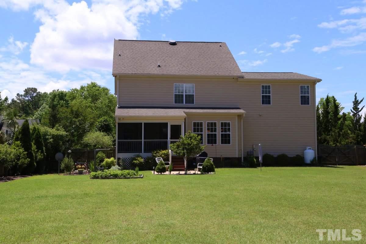 1012 Newburgh Circle Raleigh, NC 27603 - Photo 21 of 25 a front view of a house with garden