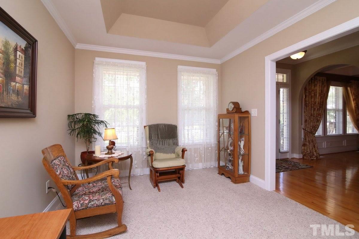 1012 Newburgh Circle Raleigh, NC 27603 - Photo 5 of 25 a living room with furniture and a window