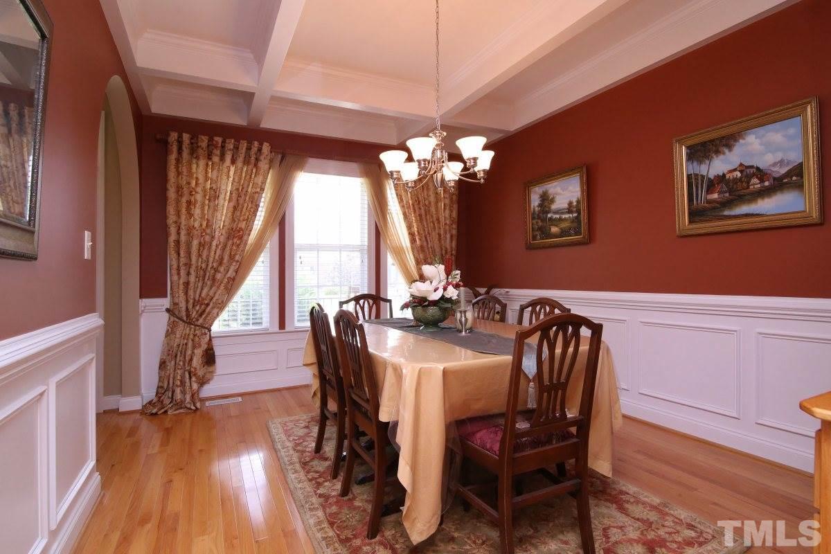 1012 Newburgh Circle Raleigh, NC 27603 - Photo 6 of 25 a view of a dining room with furniture window and wooden floor