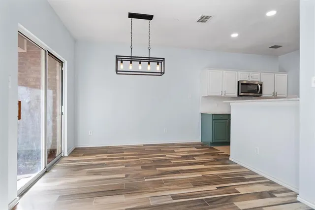 a view of kitchen and microwave