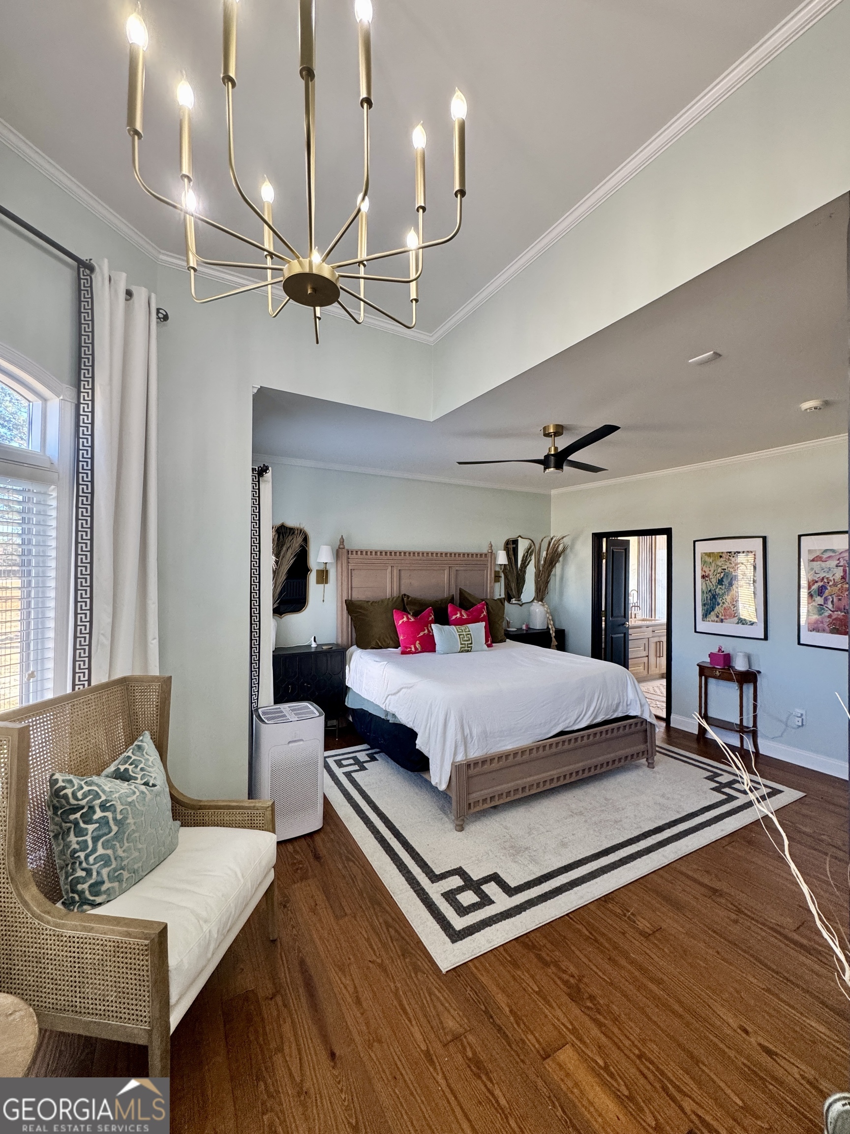 49 Aberdeen Circle Cordele, GA 31015 - Photo 29 of 63 a bedroom with a bed dresser and wooden floor