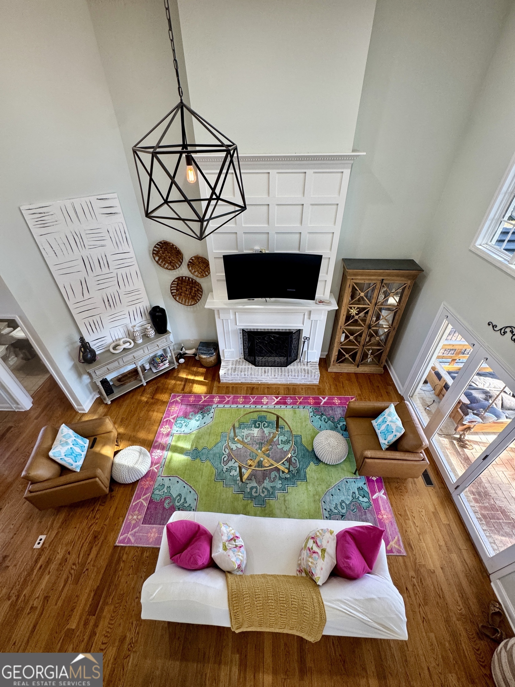 49 Aberdeen Circle Cordele, GA 31015 - Photo 36 of 63 a living room with furniture and a floor to ceiling window