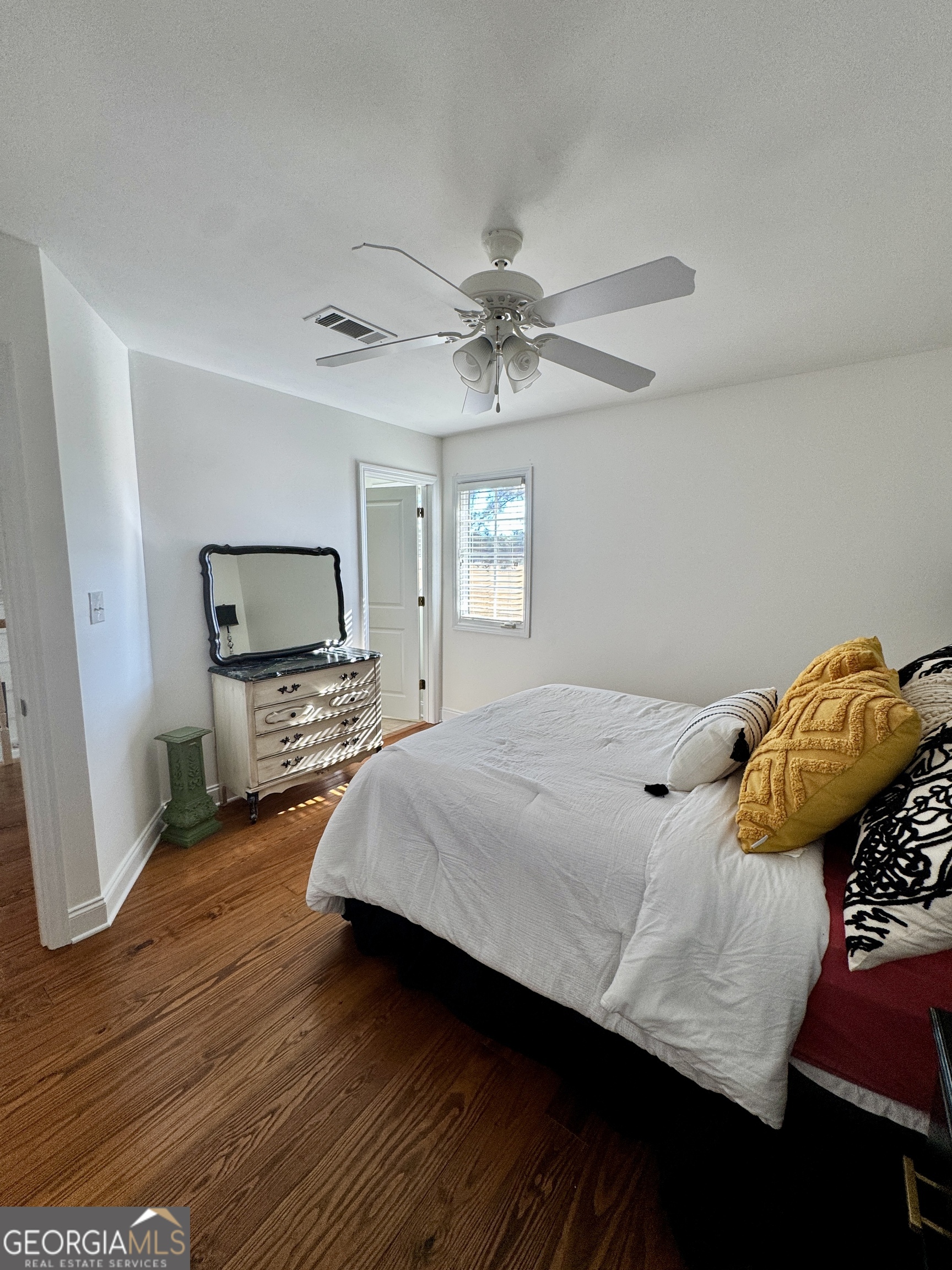 49 Aberdeen Circle Cordele, GA 31015 - Photo 39 of 63 a bedroom with a bed and a flat screen tv