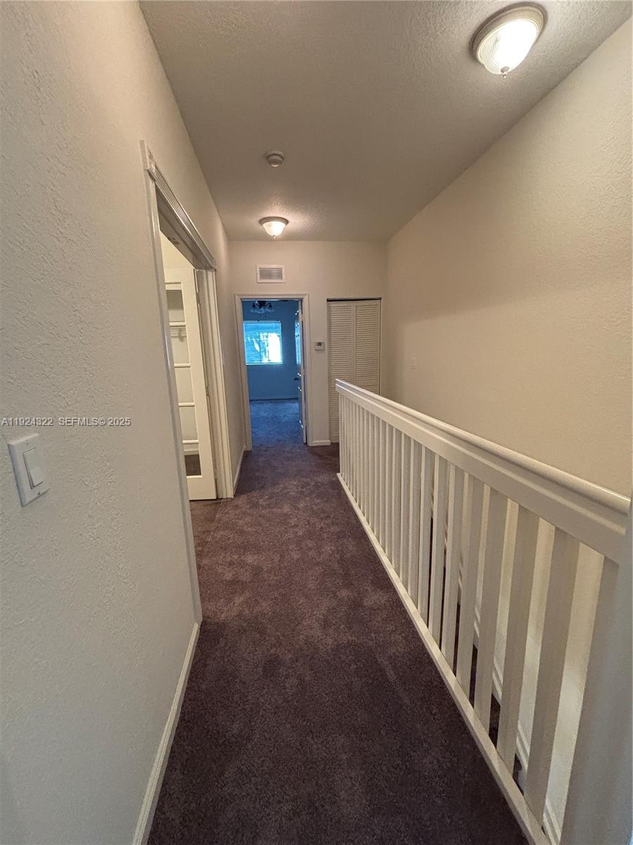 6533 Catalina Lane, Unit 6533 Tamarac, FL 33321 - Photo 11 of 27 a view of hallway
