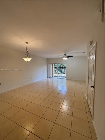 a view of a livingroom with a staircase