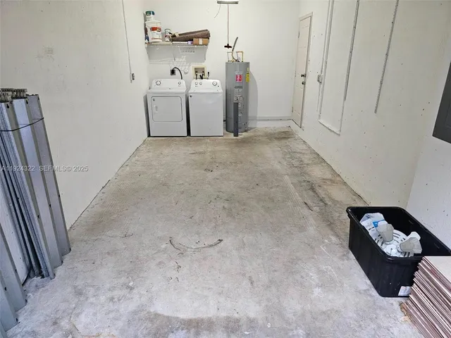 a view of utility room with closet
