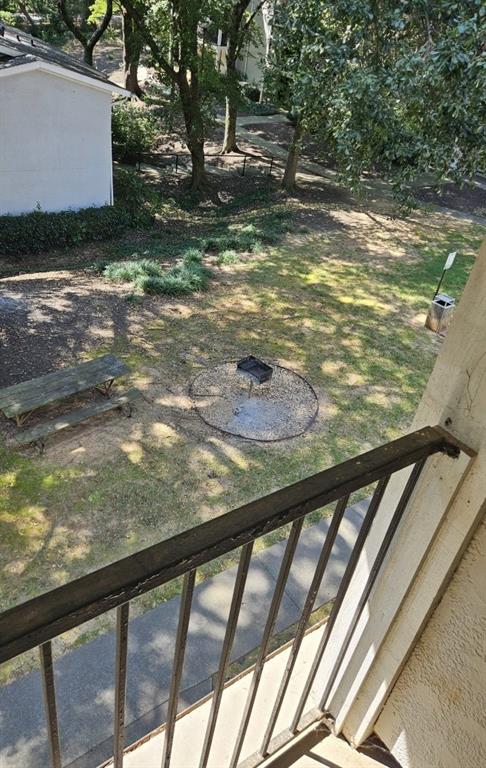 1150 Collier Road Northwest, Unit K12 Atlanta, GA 30318 - Photo 24 of 32 a view of a swimming pool from a balcony