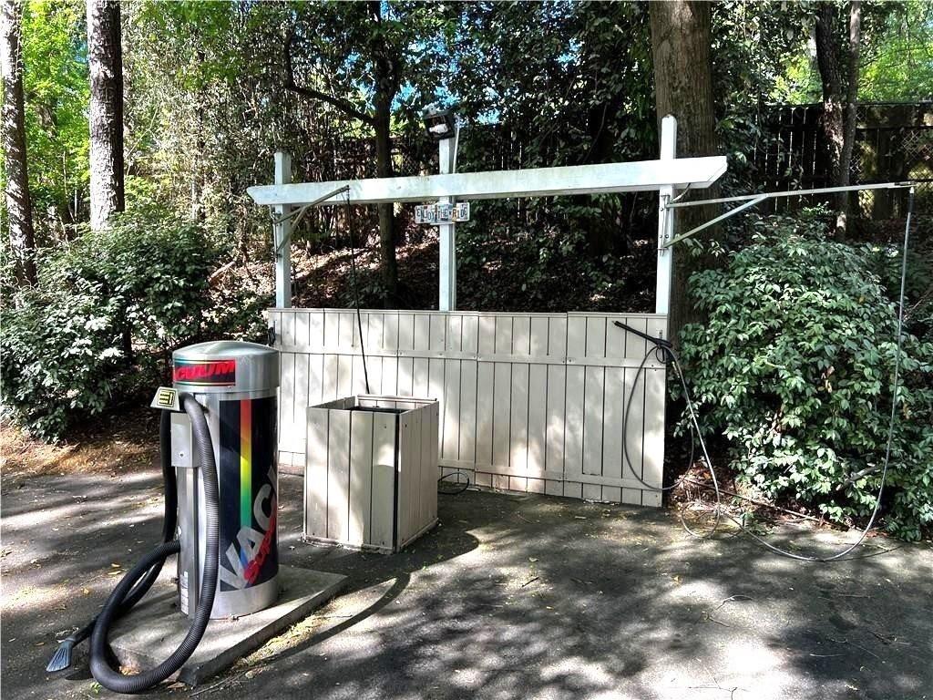 1150 Collier Road Northwest, Unit K12 Atlanta, GA 30318 - Photo 28 of 32 a view of small yard with large trees and plants