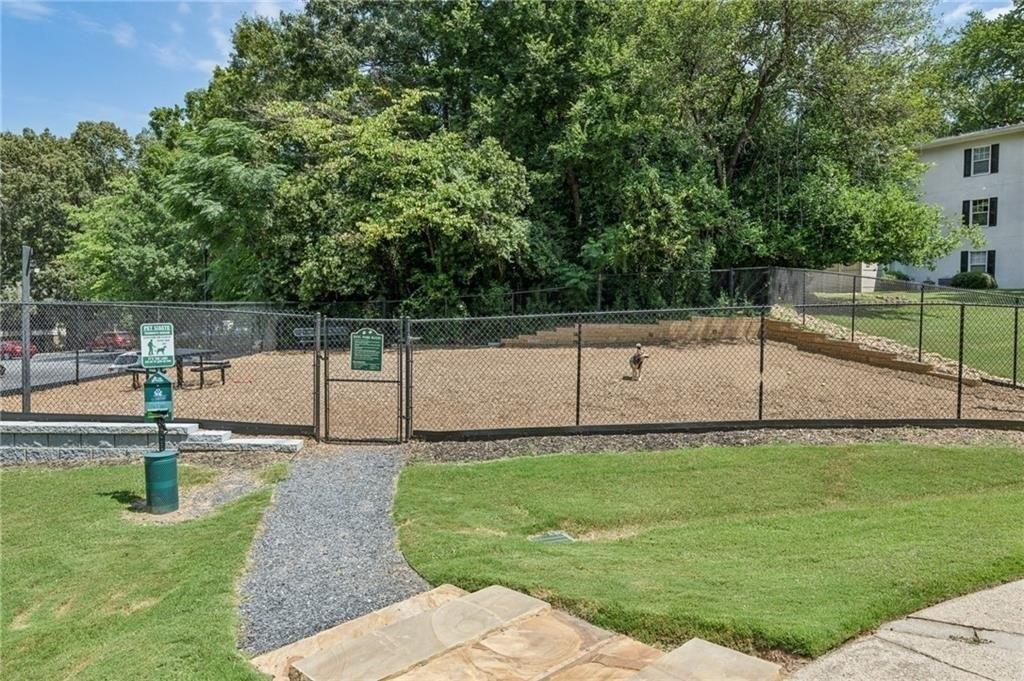 1150 Collier Road Northwest, Unit K12 Atlanta, GA 30318 - Photo 30 of 32 a view of a backyard