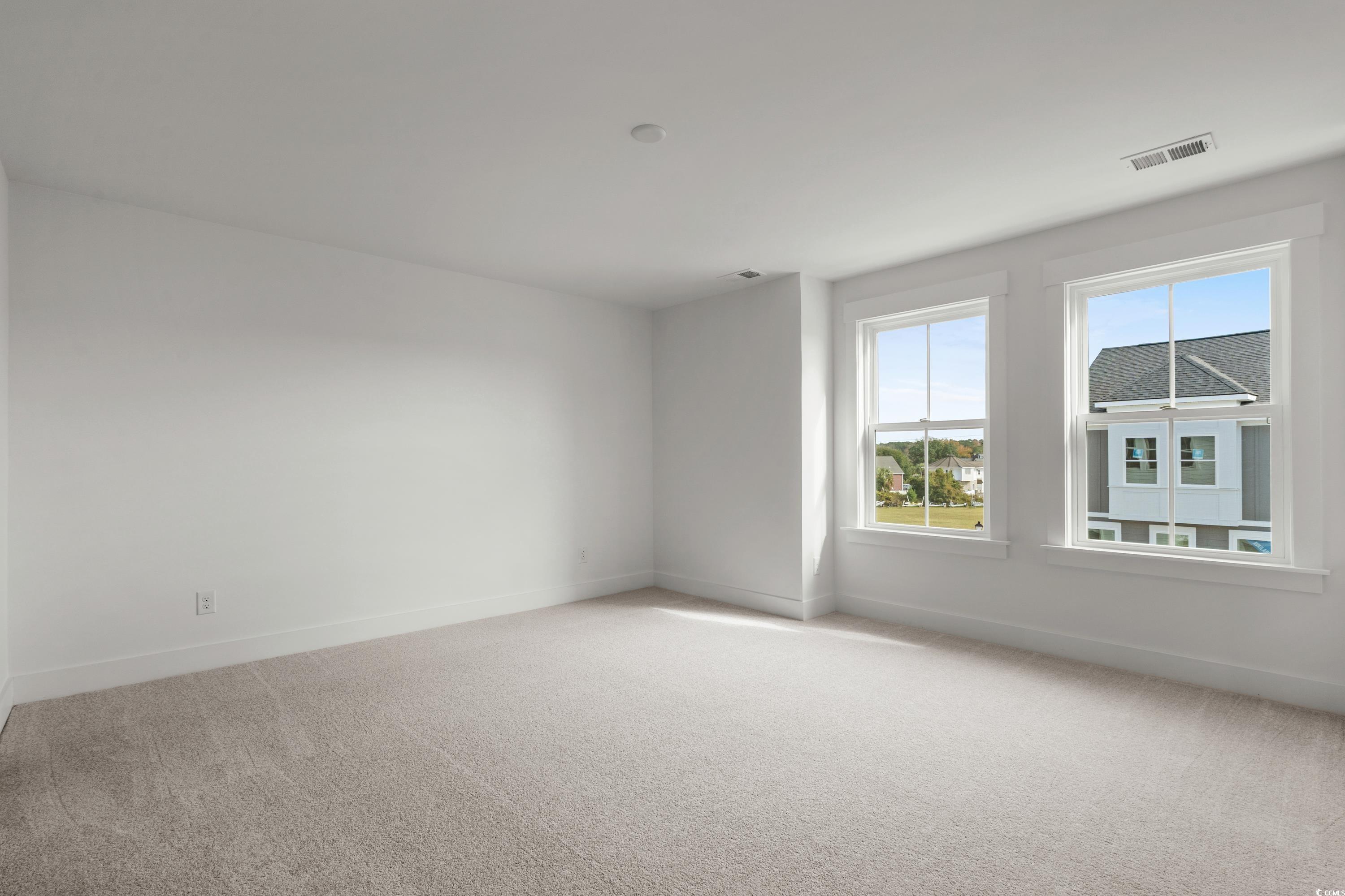 4414 Kingsport Road, Unit 1402 Little River, SC 29566 - Photo 14 of 34 Unfurnished room featuring light colored carpet and baseboards