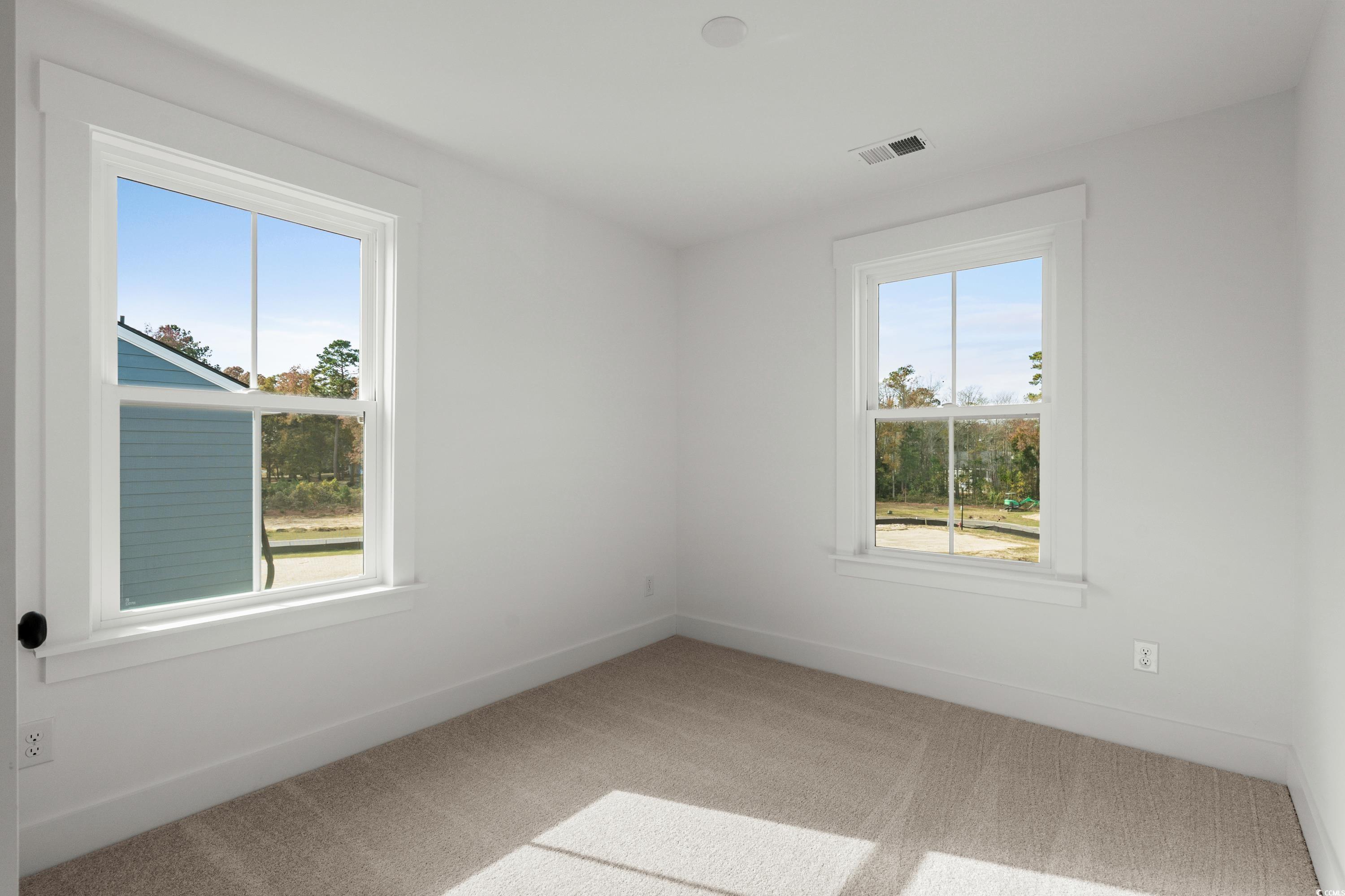 4414 Kingsport Road, Unit 1402 Little River, SC 29566 - Photo 17 of 34 Carpeted spare room with baseboards