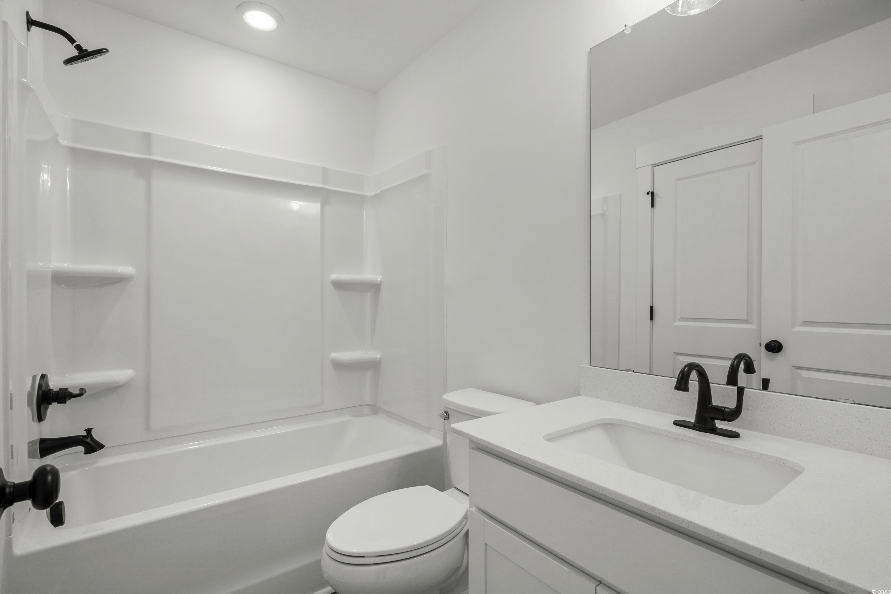 4414 Kingsport Road, Unit 1402 Little River, SC 29566 - Photo 26 of 34 Full bath featuring vanity and bathing tub / shower combination