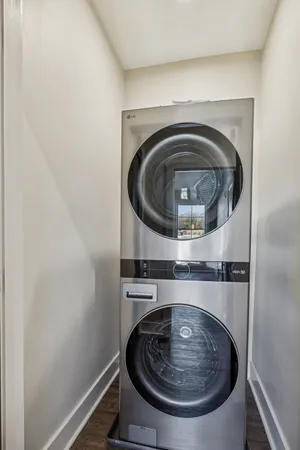 a utility room with washing machine