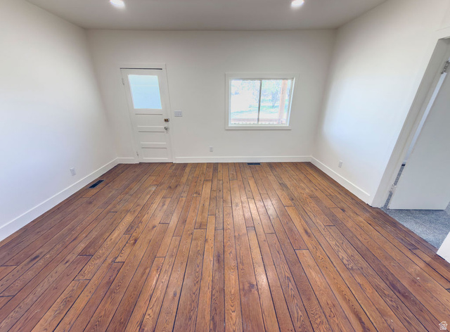 2454 East Old Wellington Road Price, UT 84501 - Photo 5 of 27 Family Room with Fresh Paint and Reclaimed 3/4 in Oak Floors and New Lighting
