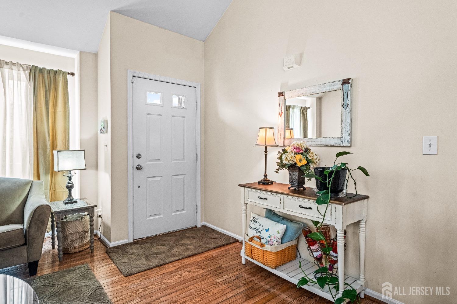 16 Dryden Drive Burlington, NJ 08016 - Photo 4 of 13 a living room with furniture and a potted plant
