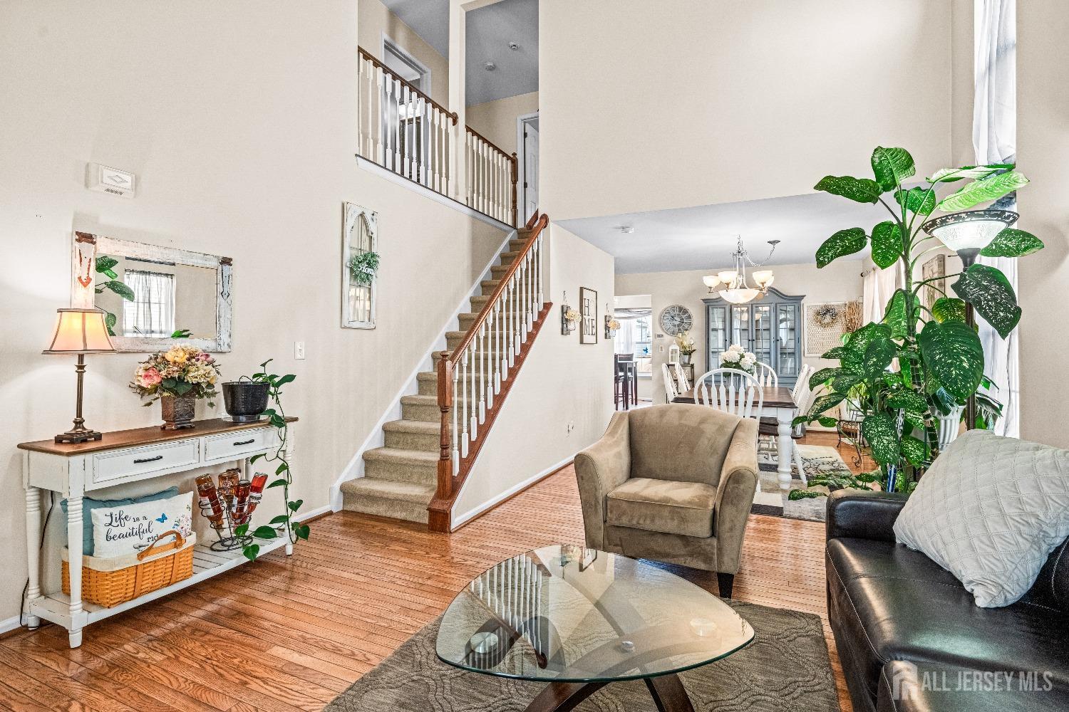 16 Dryden Drive Burlington, NJ 08016 - Photo 9 of 13 a living room with furniture and a potted plant
