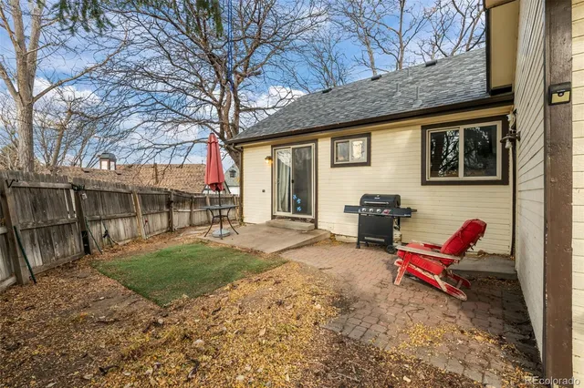 a backyard of a house with seating space