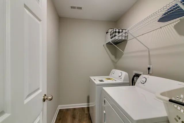 a utility room with dryer and washer