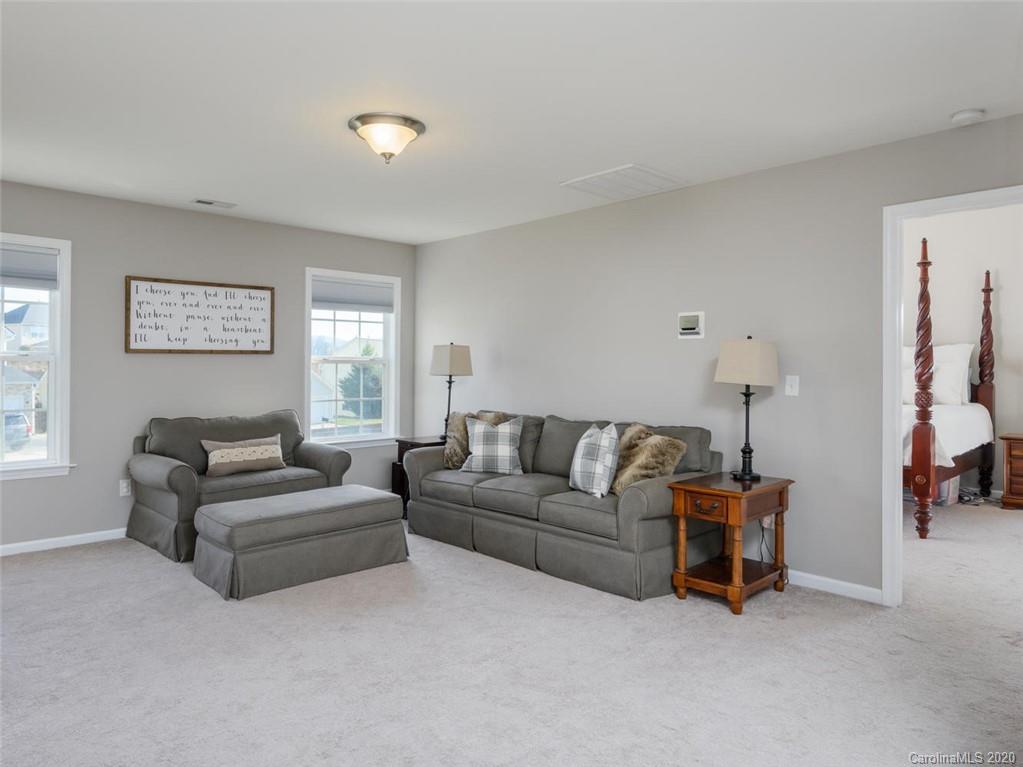 121 Haw River Road Fletcher, NC 28732 - Photo 18 of 42 a living room with furniture and a window
